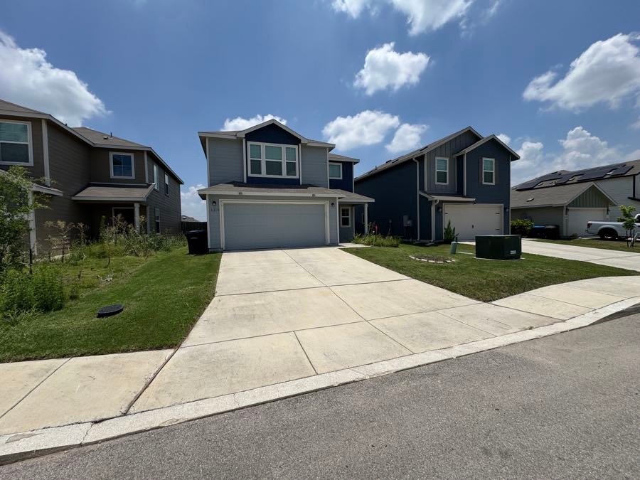 The same front yard cleanly mowed and edged after